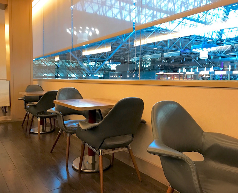 Seating Area Overlooking Airport Terminal
