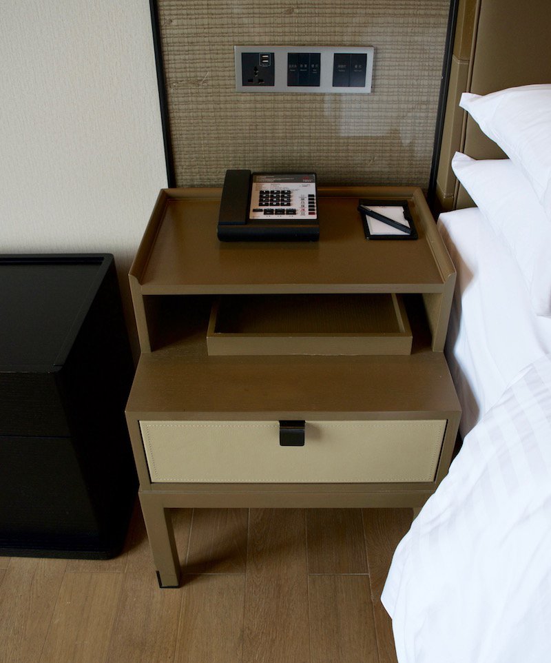 Bedside Table With Phone And Notepad 