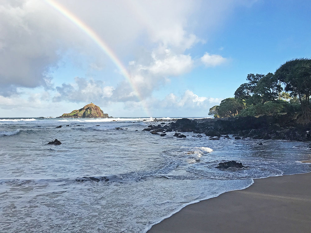 One of many rainbows and beaches to admire on the Road to Hana.