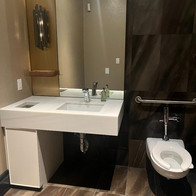 10-jw-marriott-vancouver-lounge-private-bathroom Private guest washroom located at the back of the JW Marriott Executive Lounge in Vancouver.