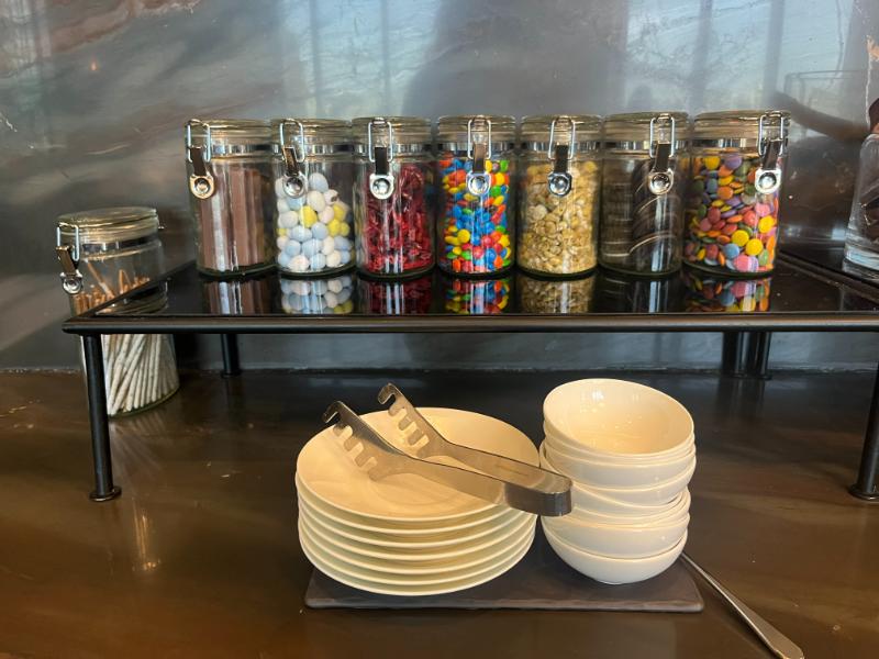 5-jw-marriott-vancouver-lounge-candy-snacks Candy and snack station for guests with a sweet tooth at JW Marriott Lounge, Vancouver.