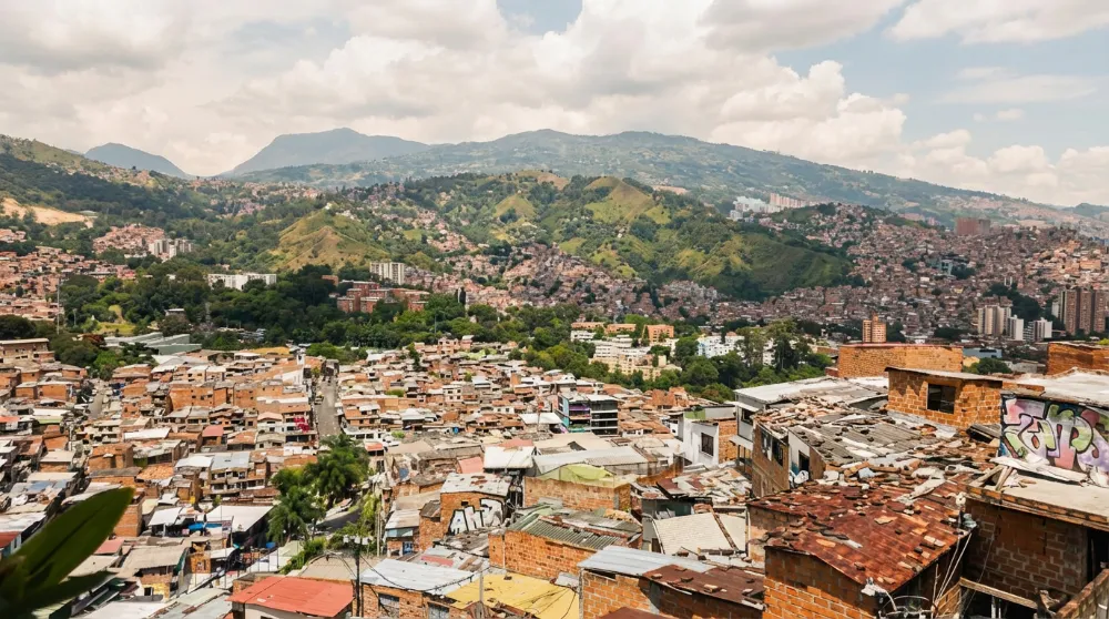 View of Comuna 13 in Medellín during a budget-friendly tour, part of my Colombia trip comparing travel costs with and without Amex perks